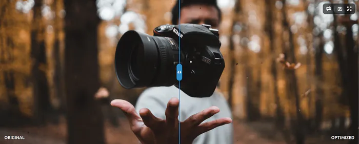 A camera held for a close photograph, representing visual comparison